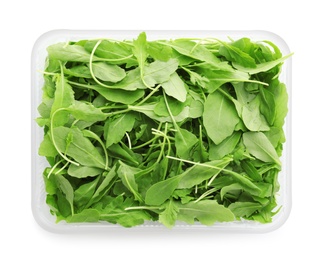 Fresh arugula in plastic container isolated on white, top view