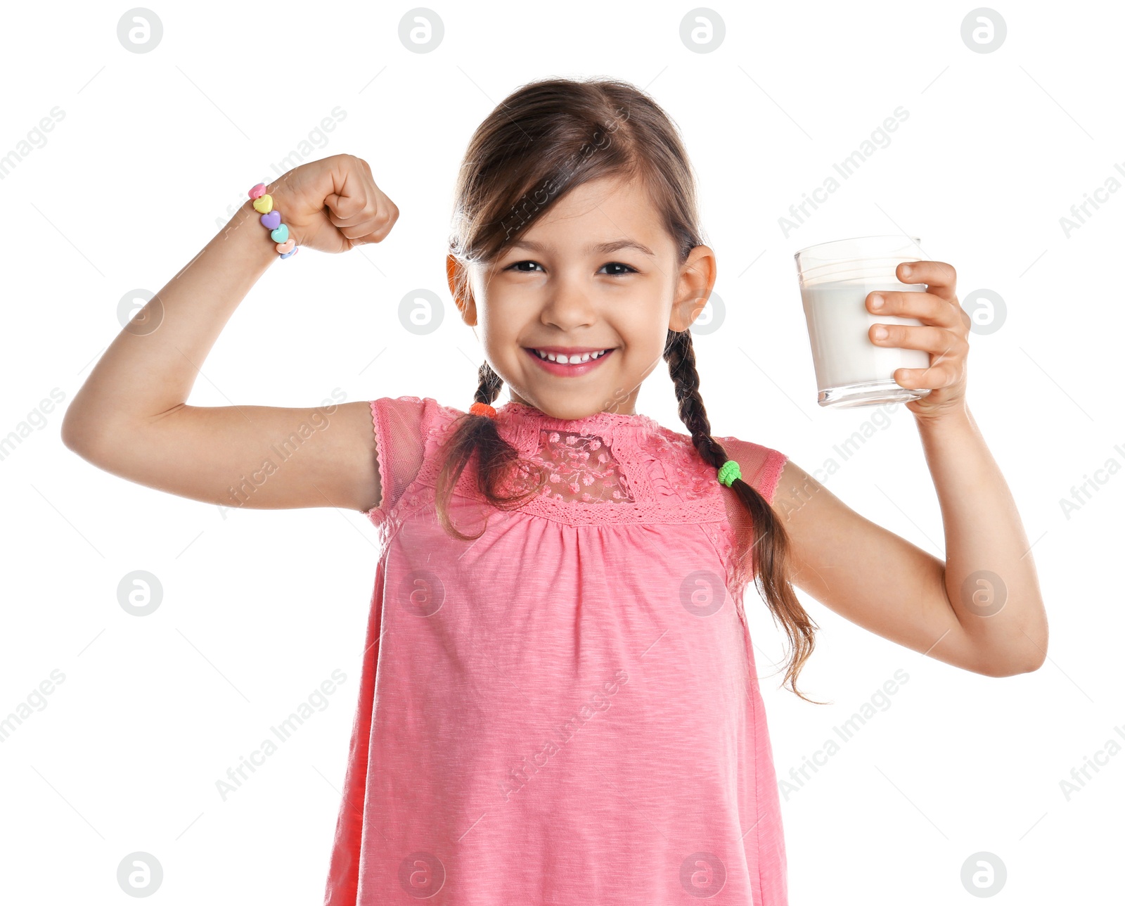 Photo of Cute little girl with glass of milk on white background