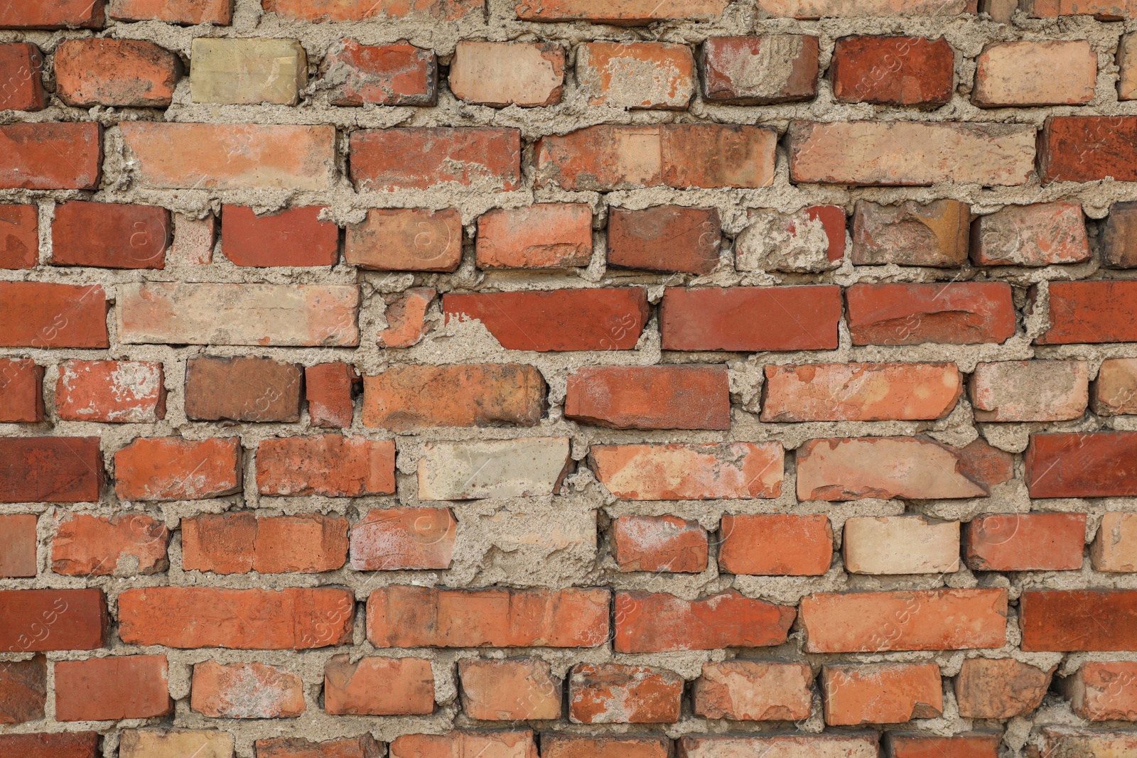 Photo of Texture of old red brick wall as background