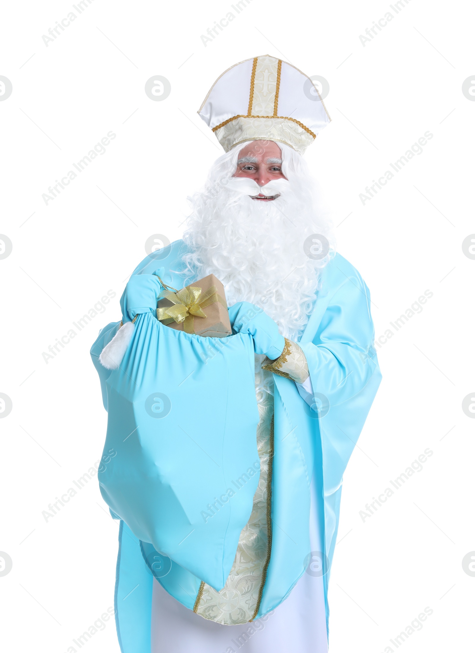 Photo of Portrait of Saint Nicholas holding sack with presents on white background