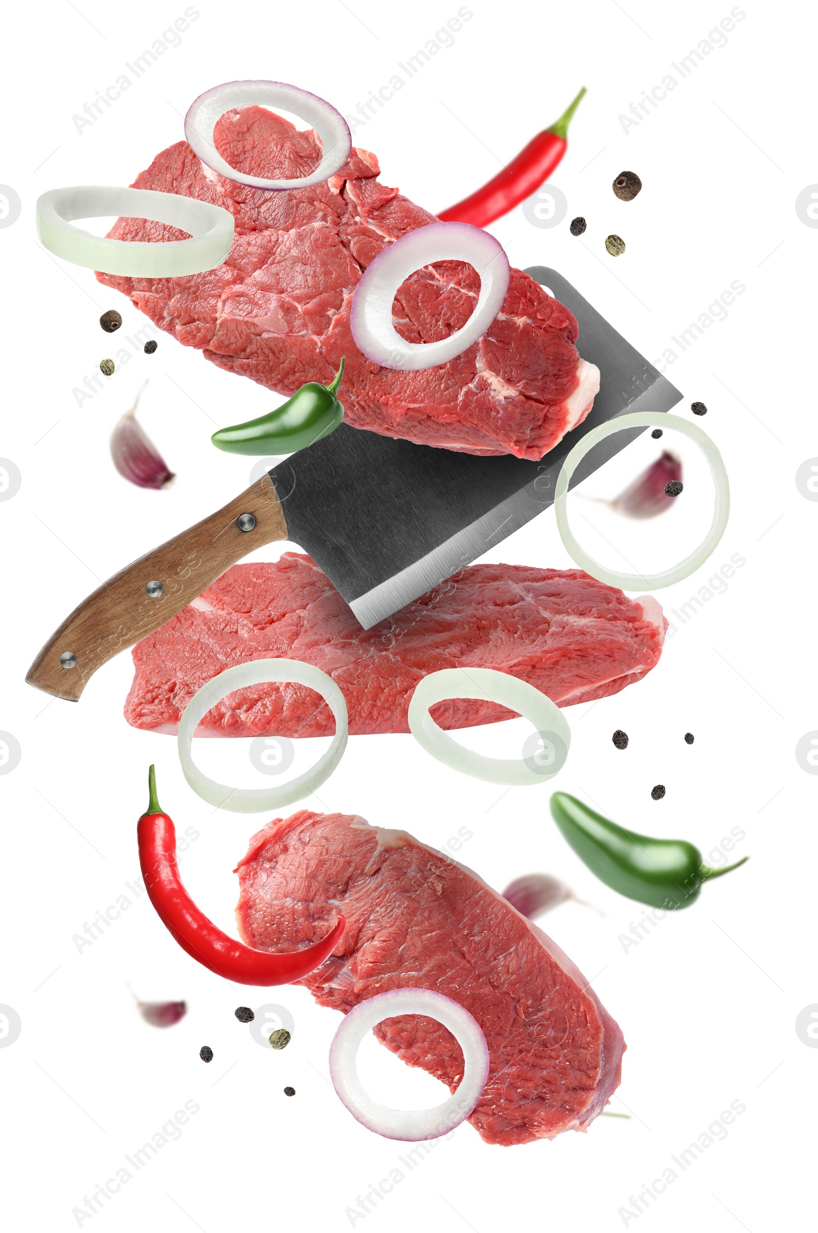 Image of Beef meat, different spices and cleaver knife falling on white background