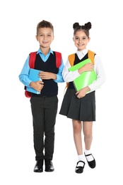 Happy children in school uniform on white background