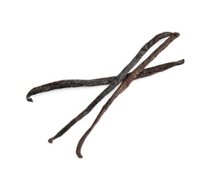 Photo of Dried aromatic vanilla sticks on white background, top view
