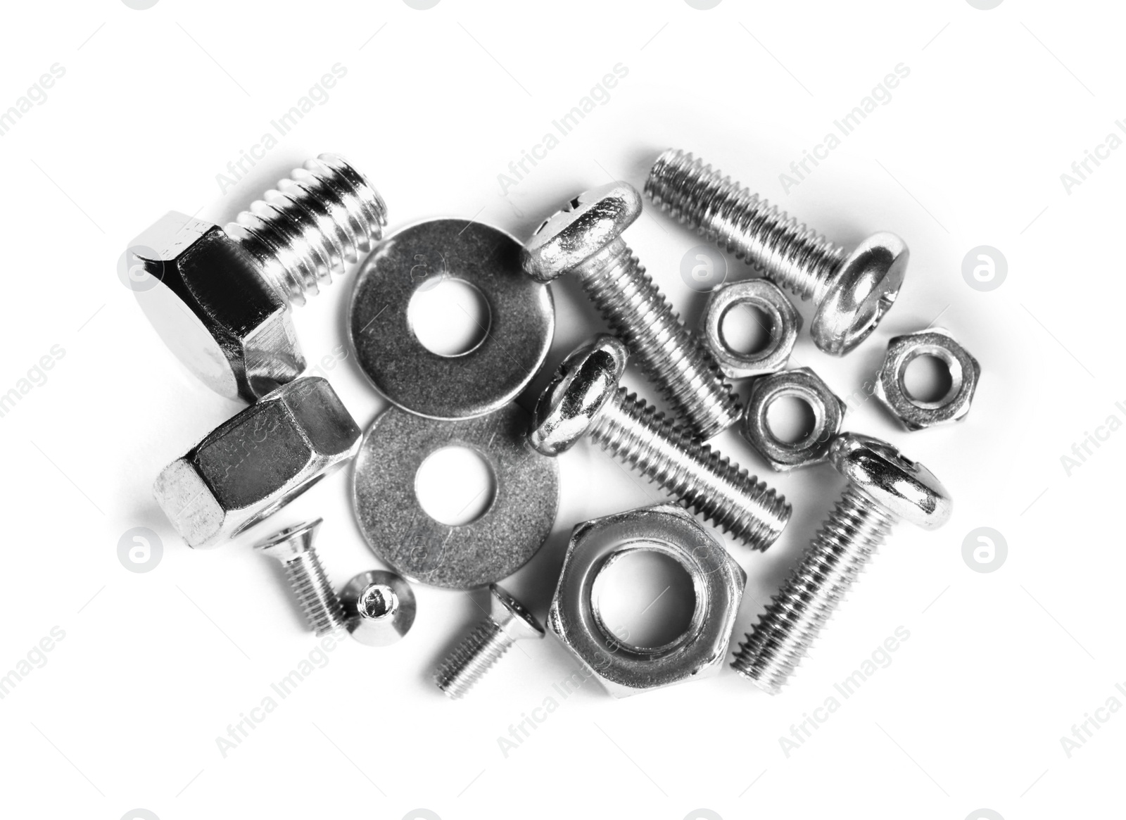 Photo of Different metal bolts and nuts on white background, top view