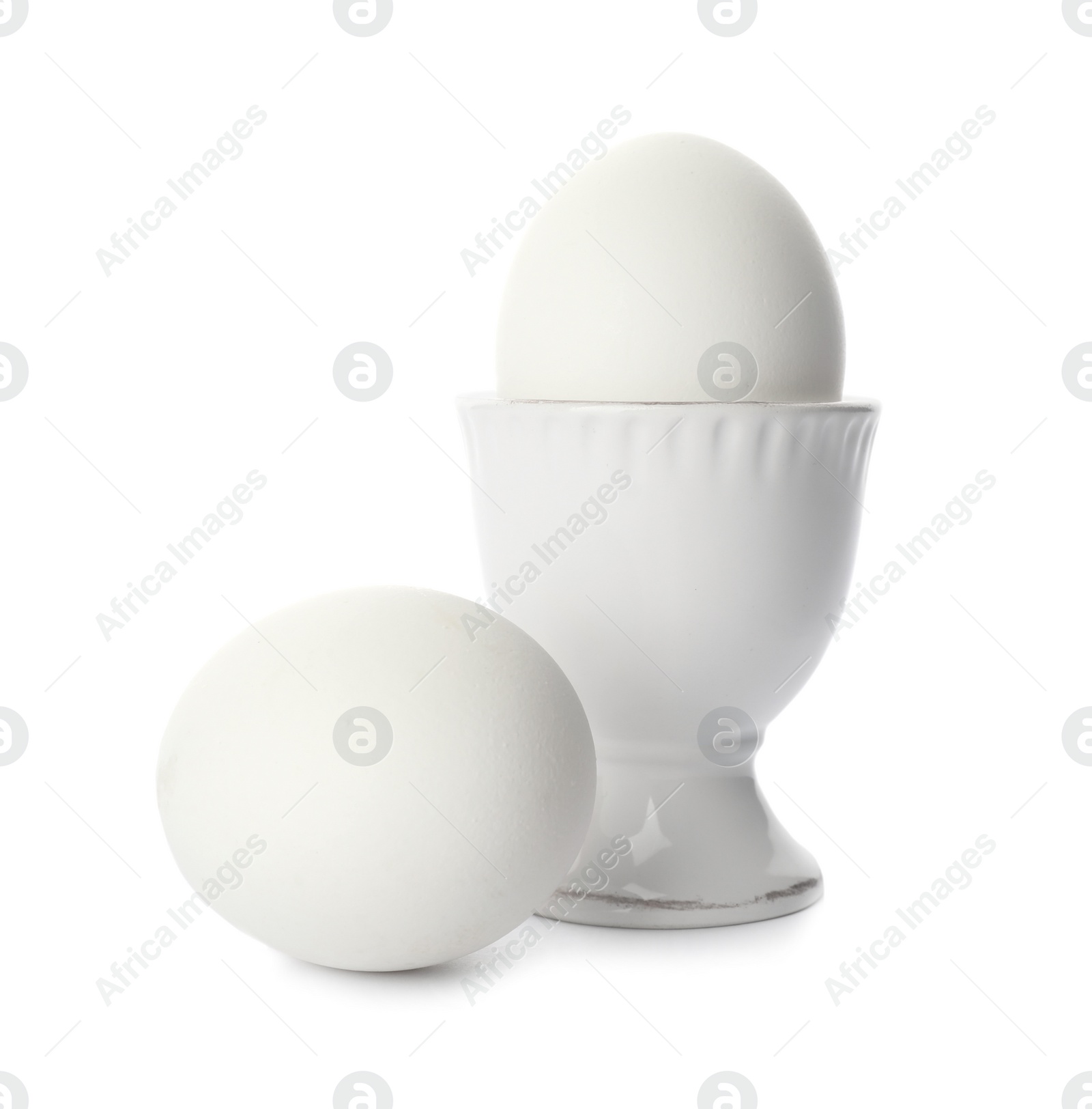 Photo of Whole hard boiled eggs on white background