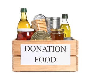 Photo of Donation crate with food isolated on white