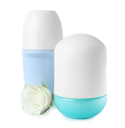 Photo of Natural female roll-on deodorants with rose on white background. Skin care