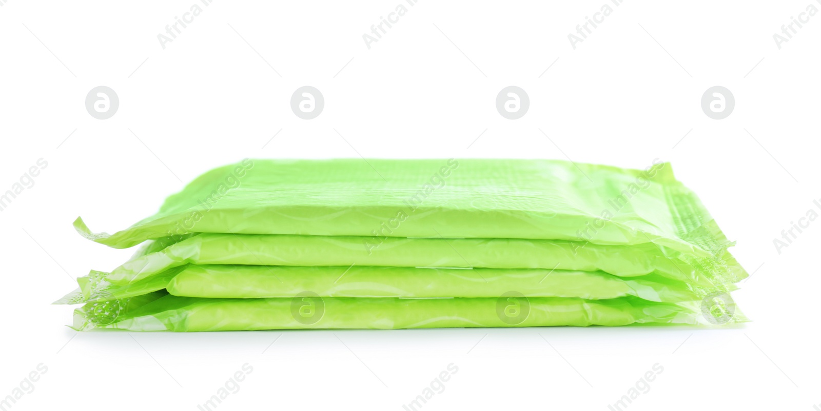 Photo of Stack of menstrual pads on white background. Gynecological care