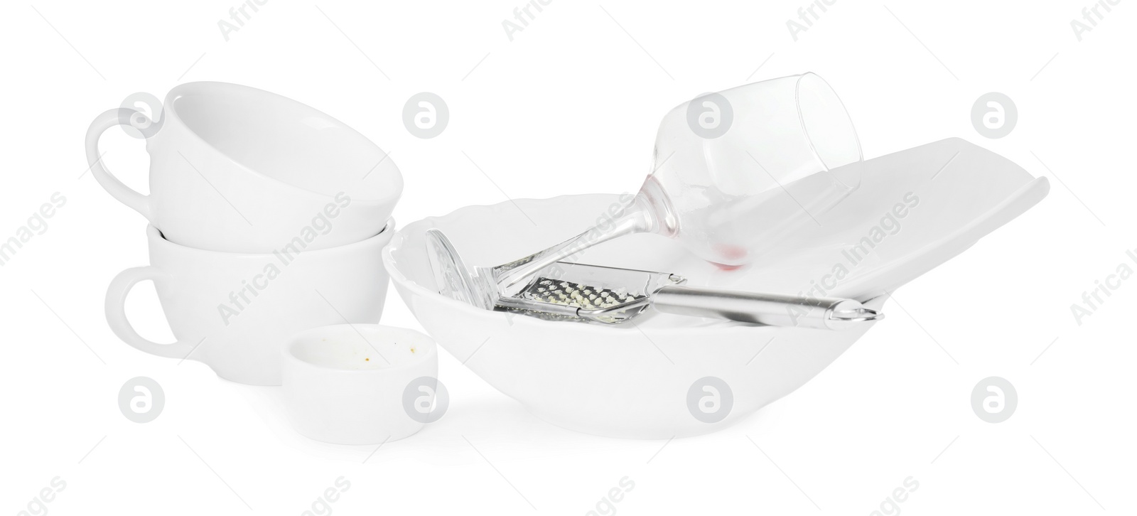 Photo of Set of dirty dishes isolated on white