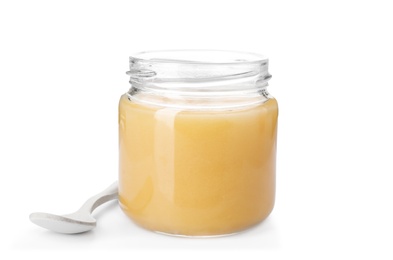 Photo of Jar with delicious honey and spoon on white background