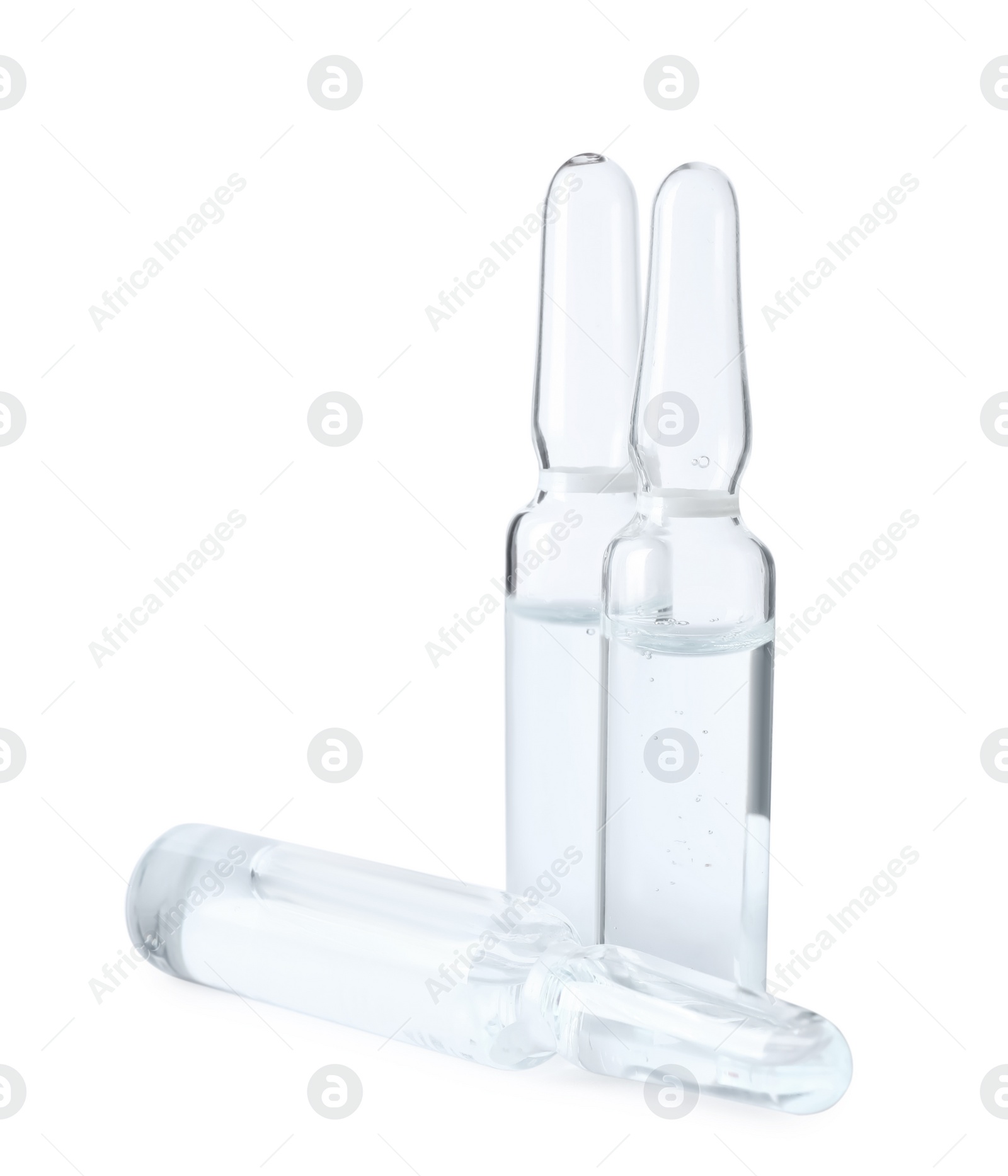 Photo of Pharmaceutical ampoules with medication on white background