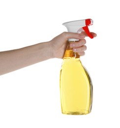 Photo of Woman holding plastic spray bottle with liquid isolated on white, closeup