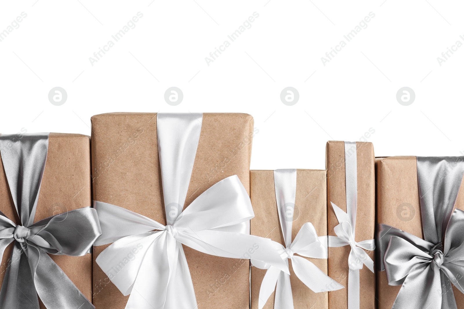 Photo of Beautifully wrapped gift boxes on white background