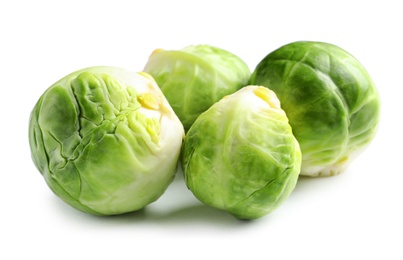 Fresh tasty Brussels sprouts on white background