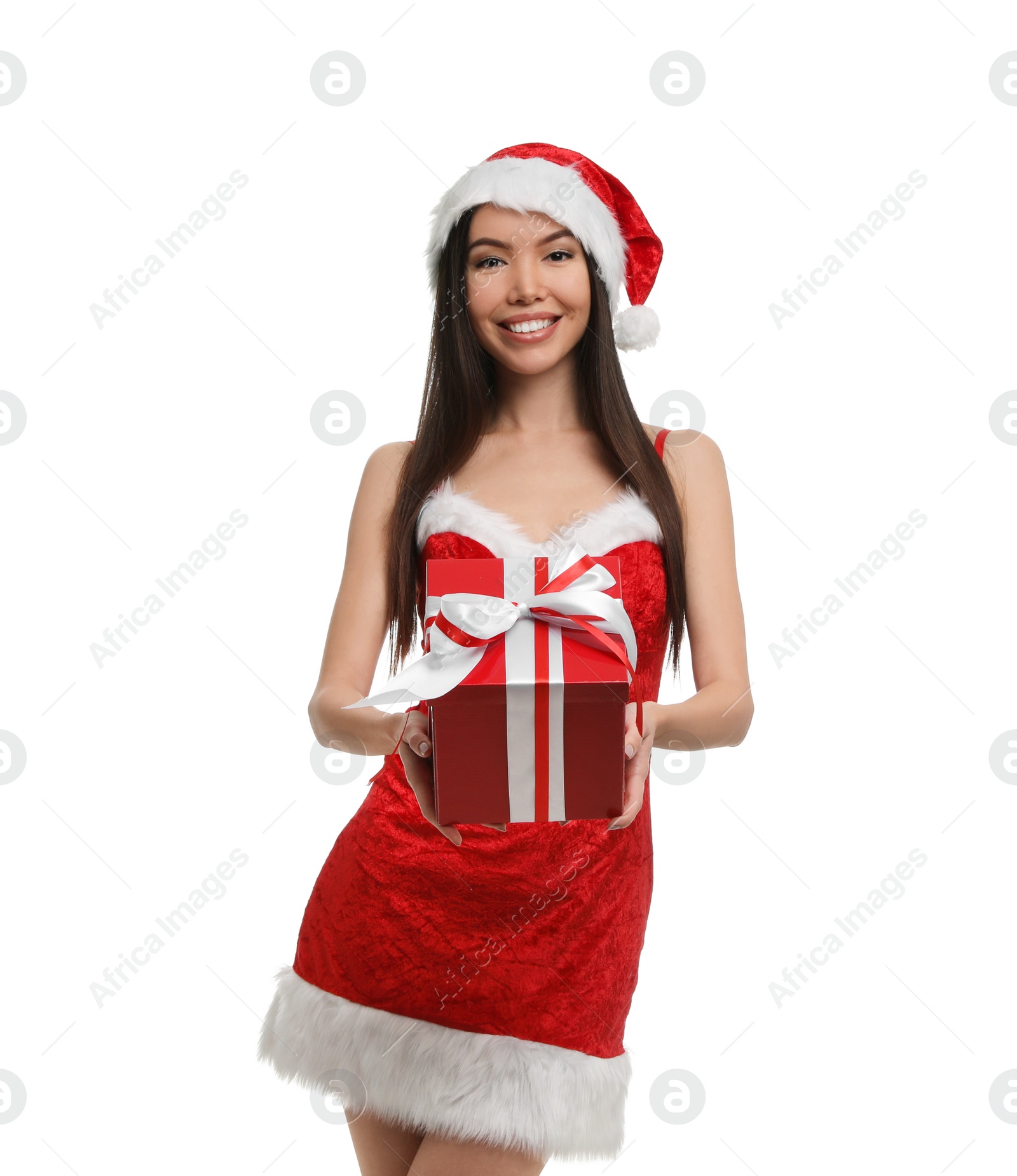 Photo of Beautiful Asian woman in Santa costume with Christmas gift on white background