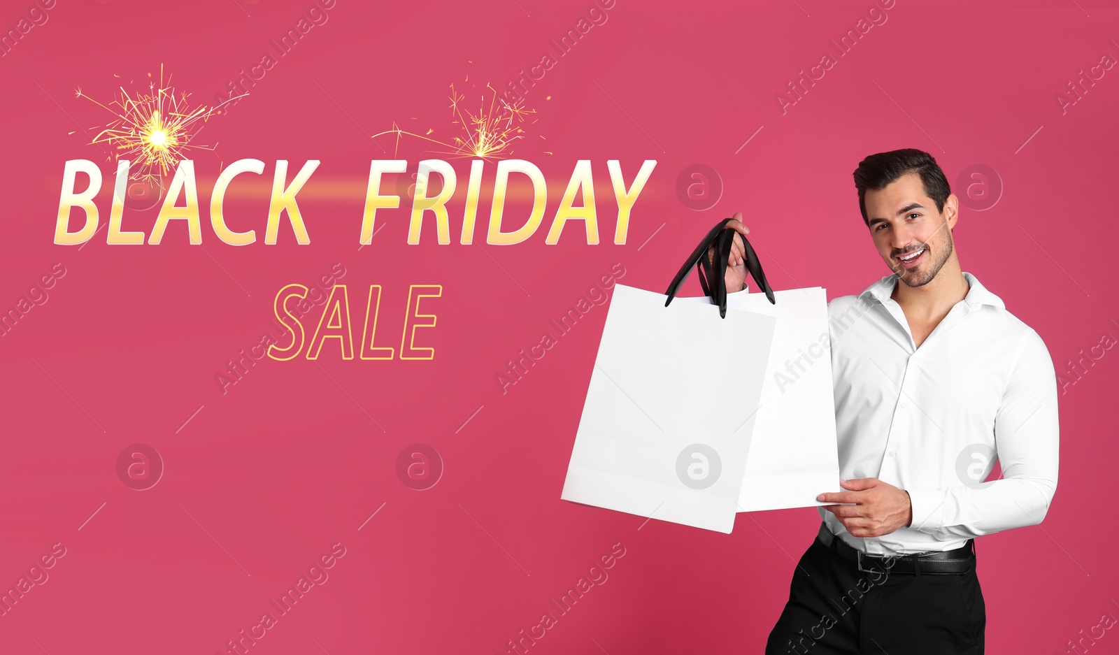 Image of Black Friday Sale. Young handsome man with shopping bag on pink background, banner design