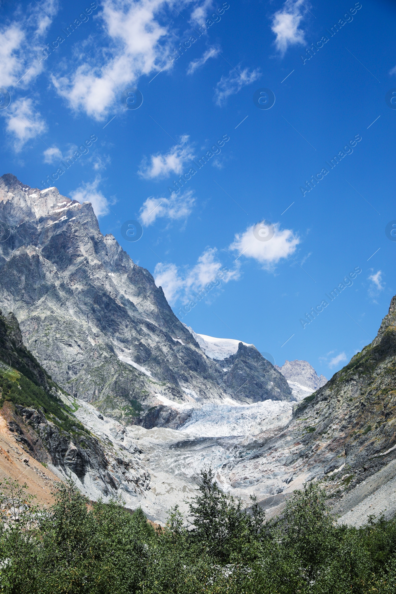 Photo of Picturesque view of mountains under cloudy sky