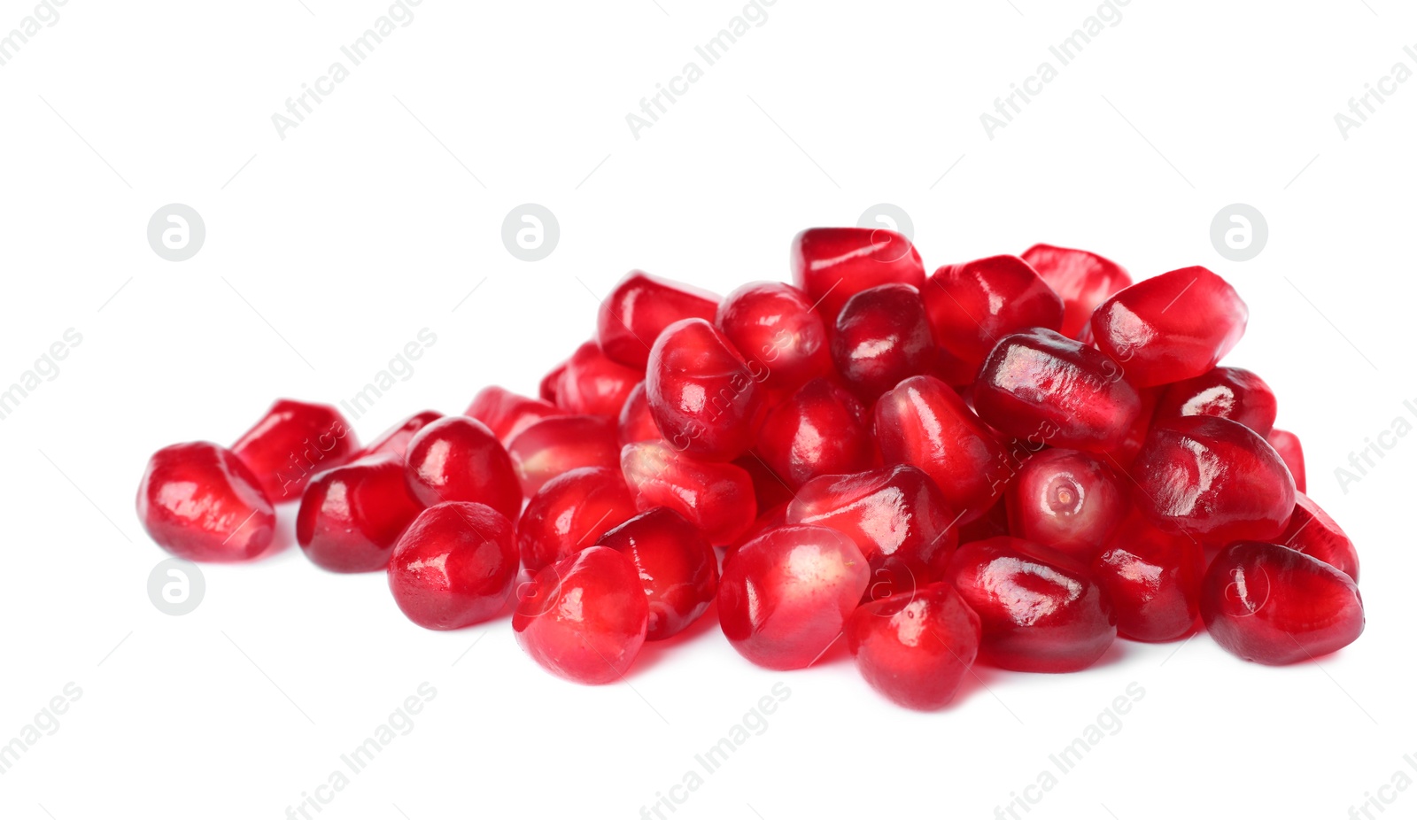 Photo of Pile of tasty pomegranate seeds on white background