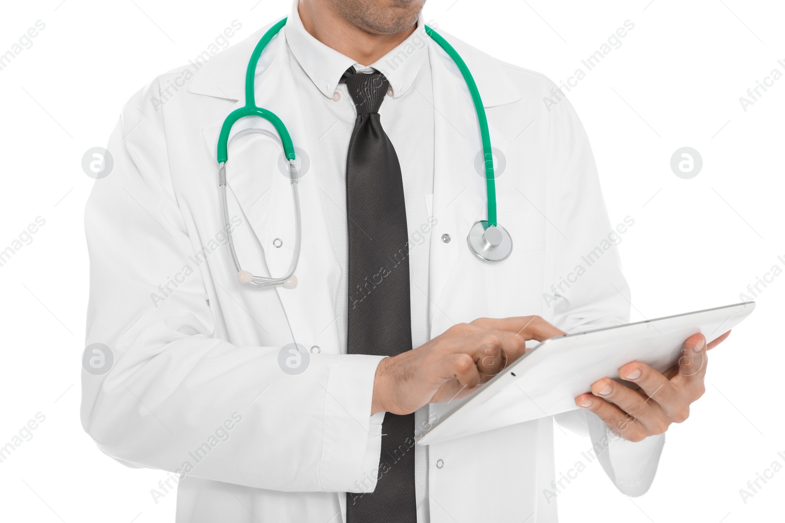 Photo of Medical doctor with stethoscope and tablet isolated on white, closeup