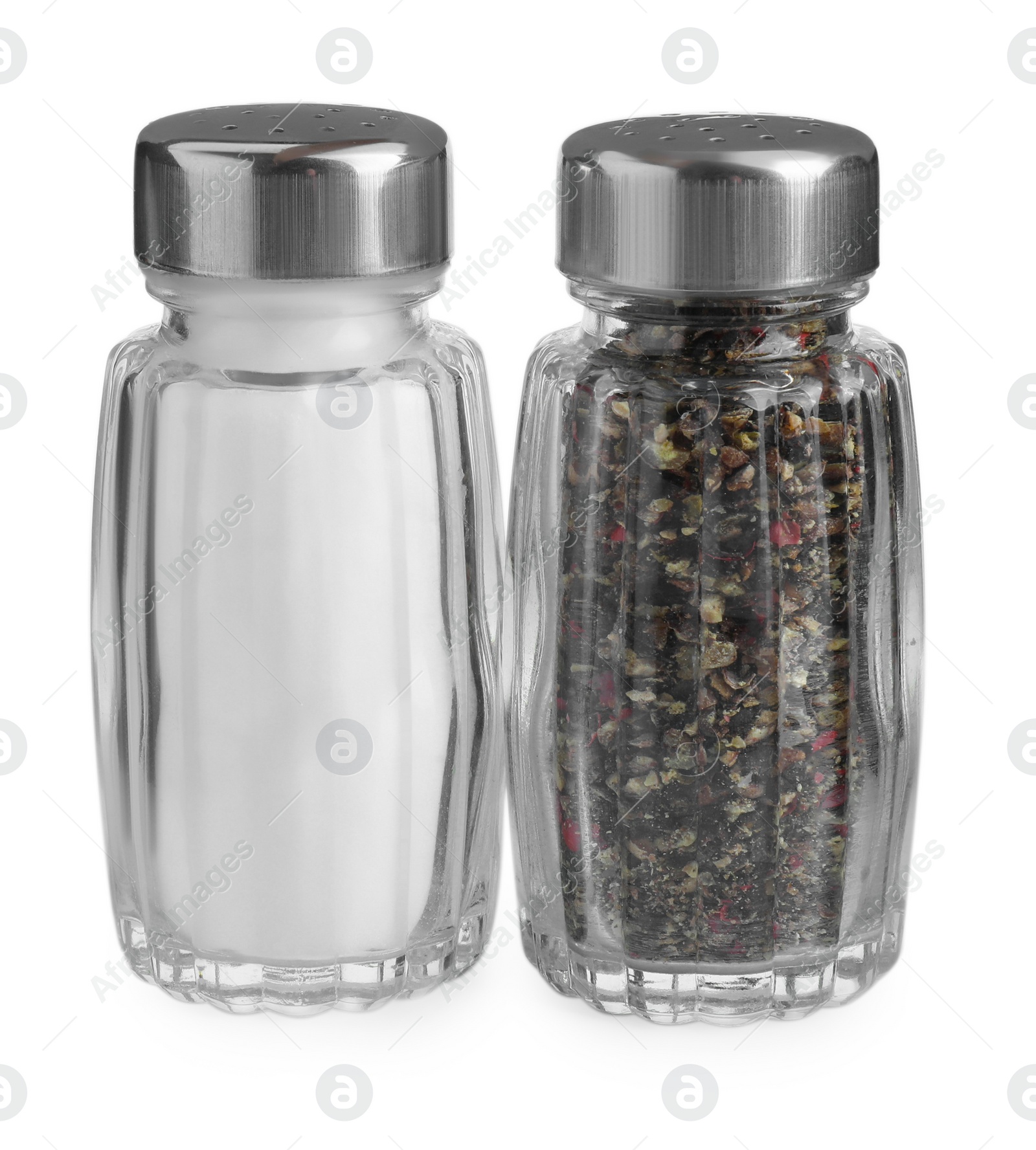 Photo of Salt and pepper shakers isolated on white