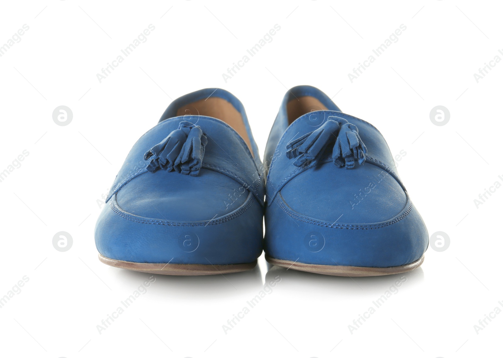 Photo of Pair of female shoes on white background