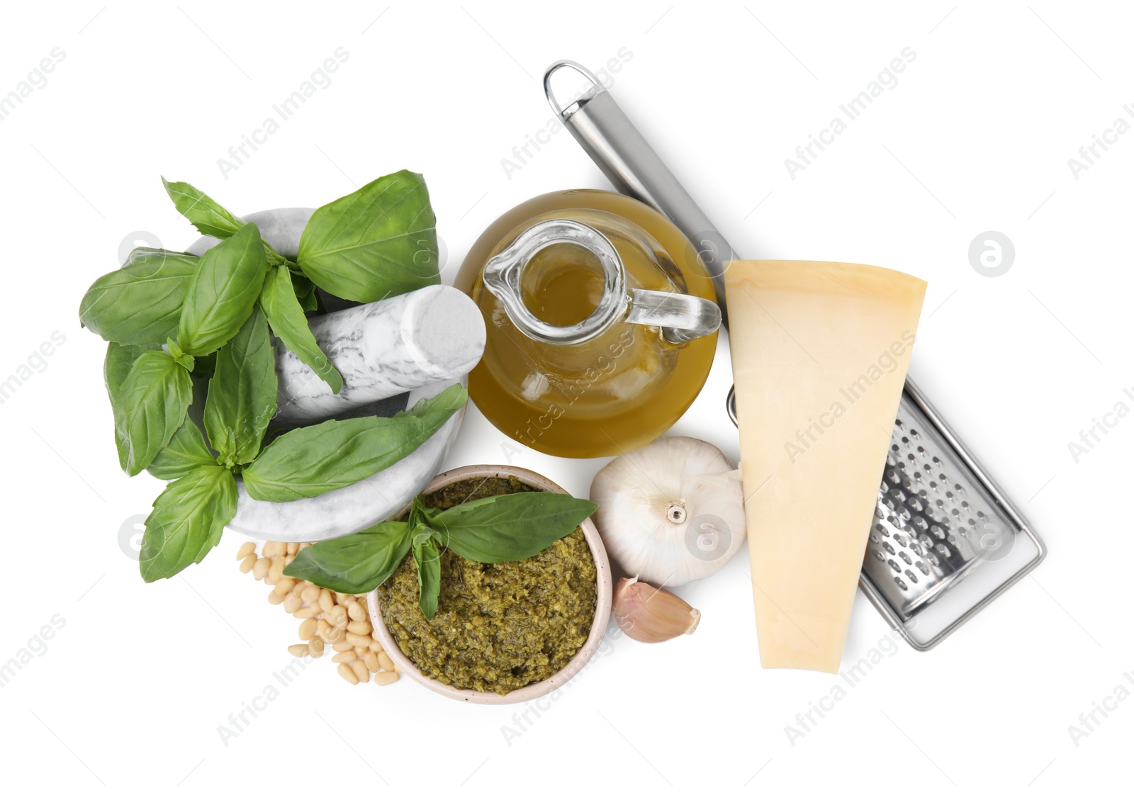 Photo of Different ingredients for cooking tasty pesto sauce isolated on white, top view