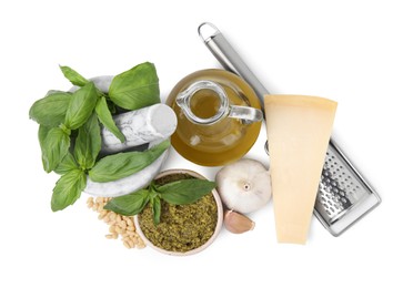 Different ingredients for cooking tasty pesto sauce isolated on white, top view