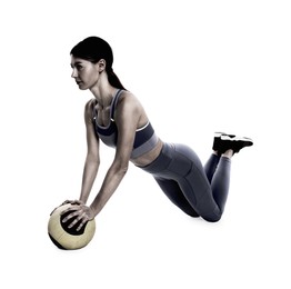 Athletic woman doing exercise with medicine ball isolated on white