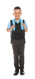 Photo of Full length portrait of cute African-American boy in school uniform with backpack on white background