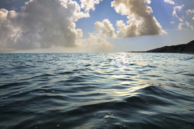 Beautiful view of seascape and blue sky with white clouds on sunny day