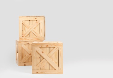 Photo of Wooden crates on white background. Shipping containers