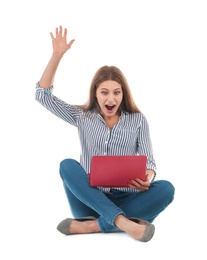 Photo of Emotional young woman with laptop celebrating victory on white background