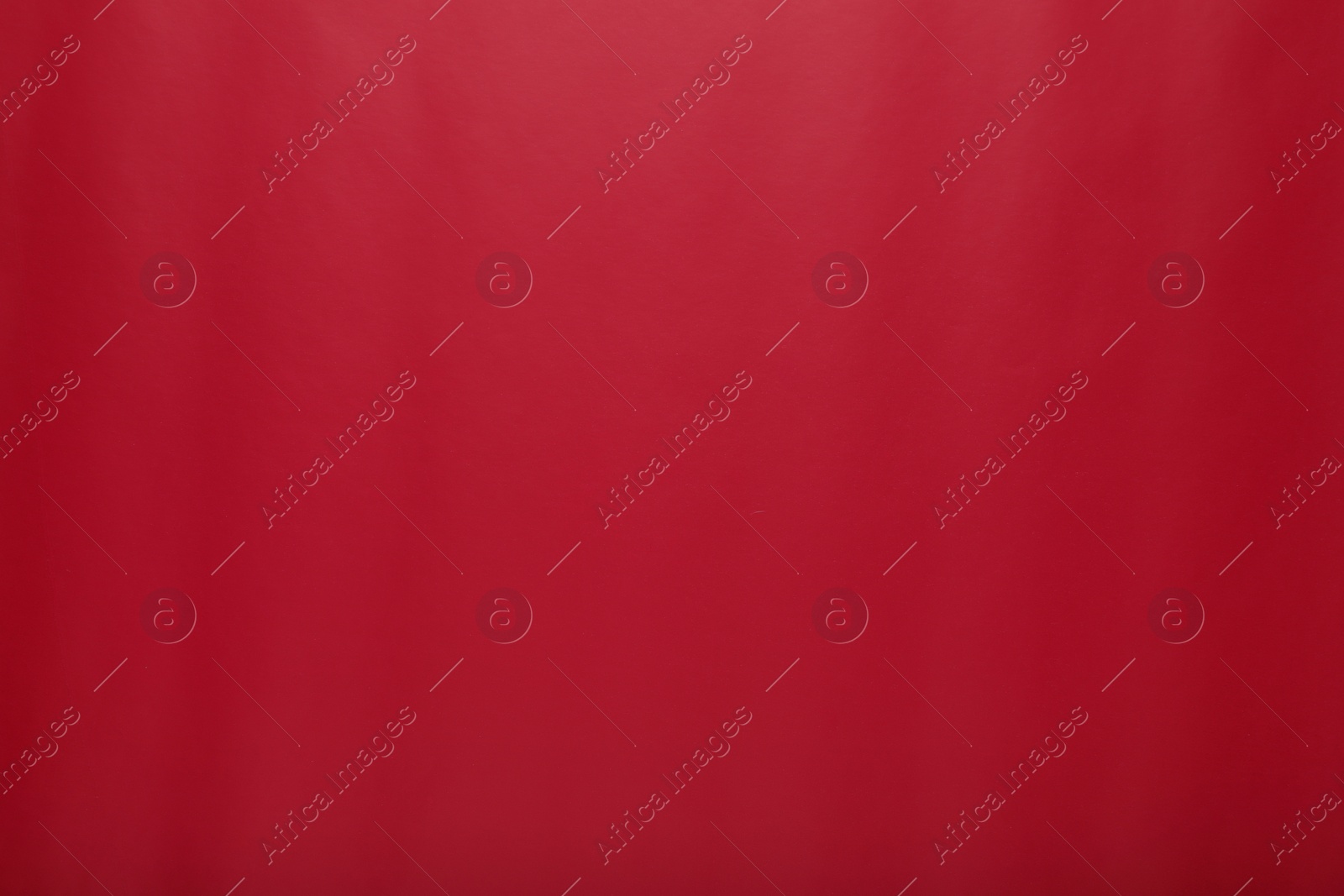 Photo of Red wrapping paper as background, top view