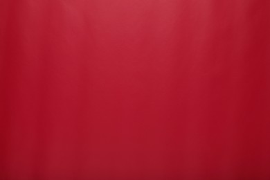 Photo of Red wrapping paper as background, top view