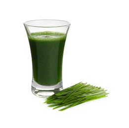 Photo of Glass of fresh wheat grass juice and sprouts on white background