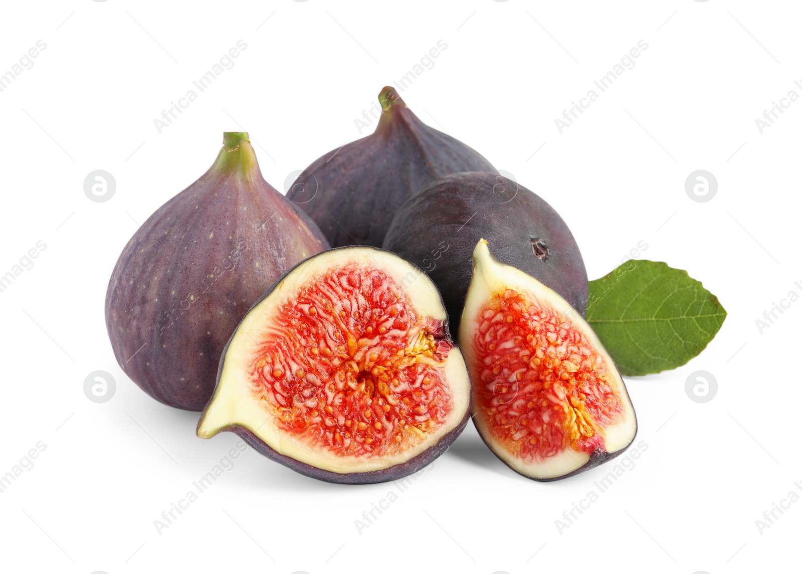 Photo of Cut and whole ripe figs isolated on white