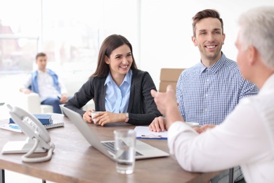 Human resources commission conducting job interview with applicant in office