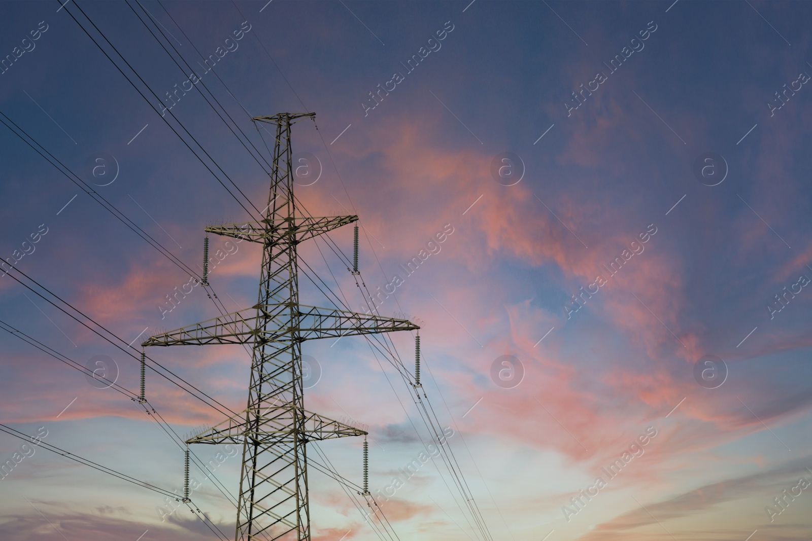 Photo of Telephone pole with cables at sunset outdoors, space for text