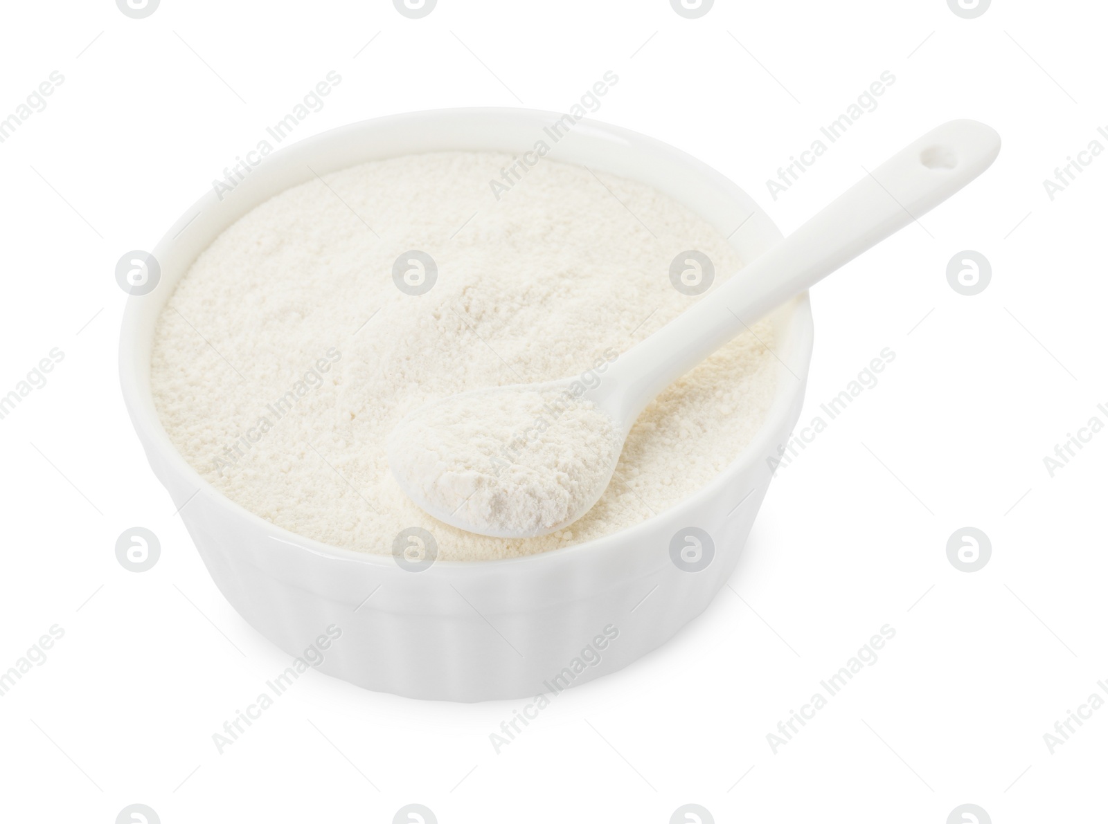 Photo of Baking powder in bowl and spoon isolated on white