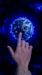 Image of Man pointing at digital model of Earth on dark background, closeup