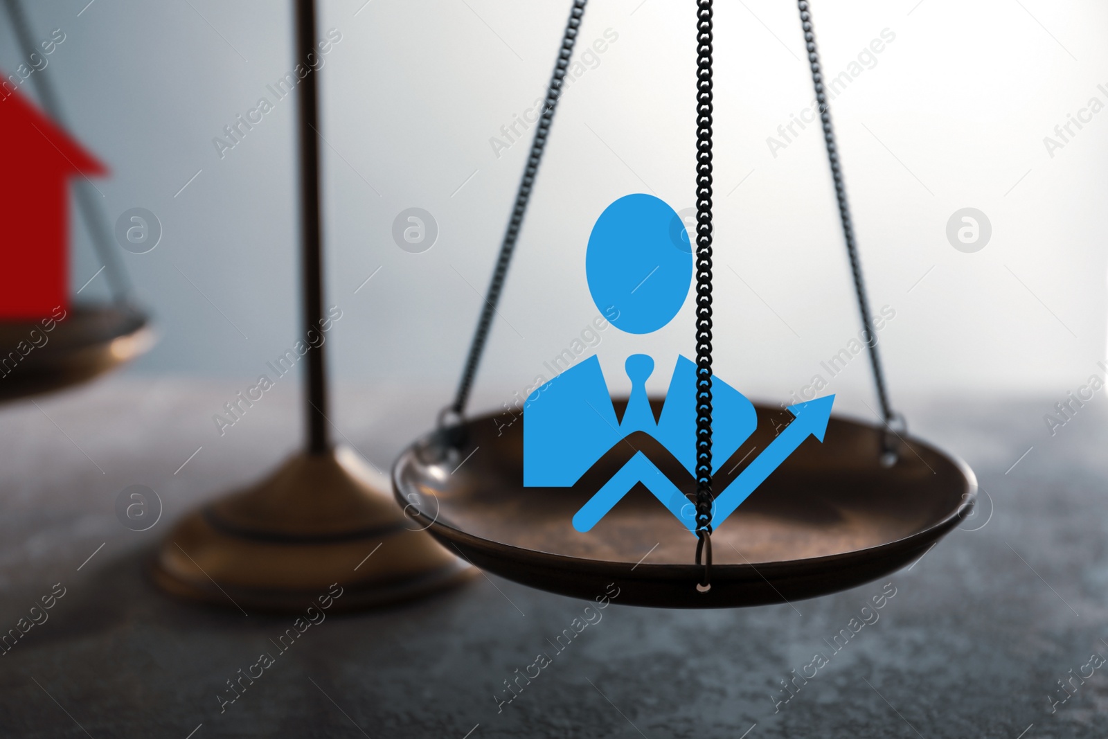 Image of Work-life balance concept. Scale with images on table, closeup