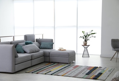 Photo of Modern living room interior with comfortable sofa