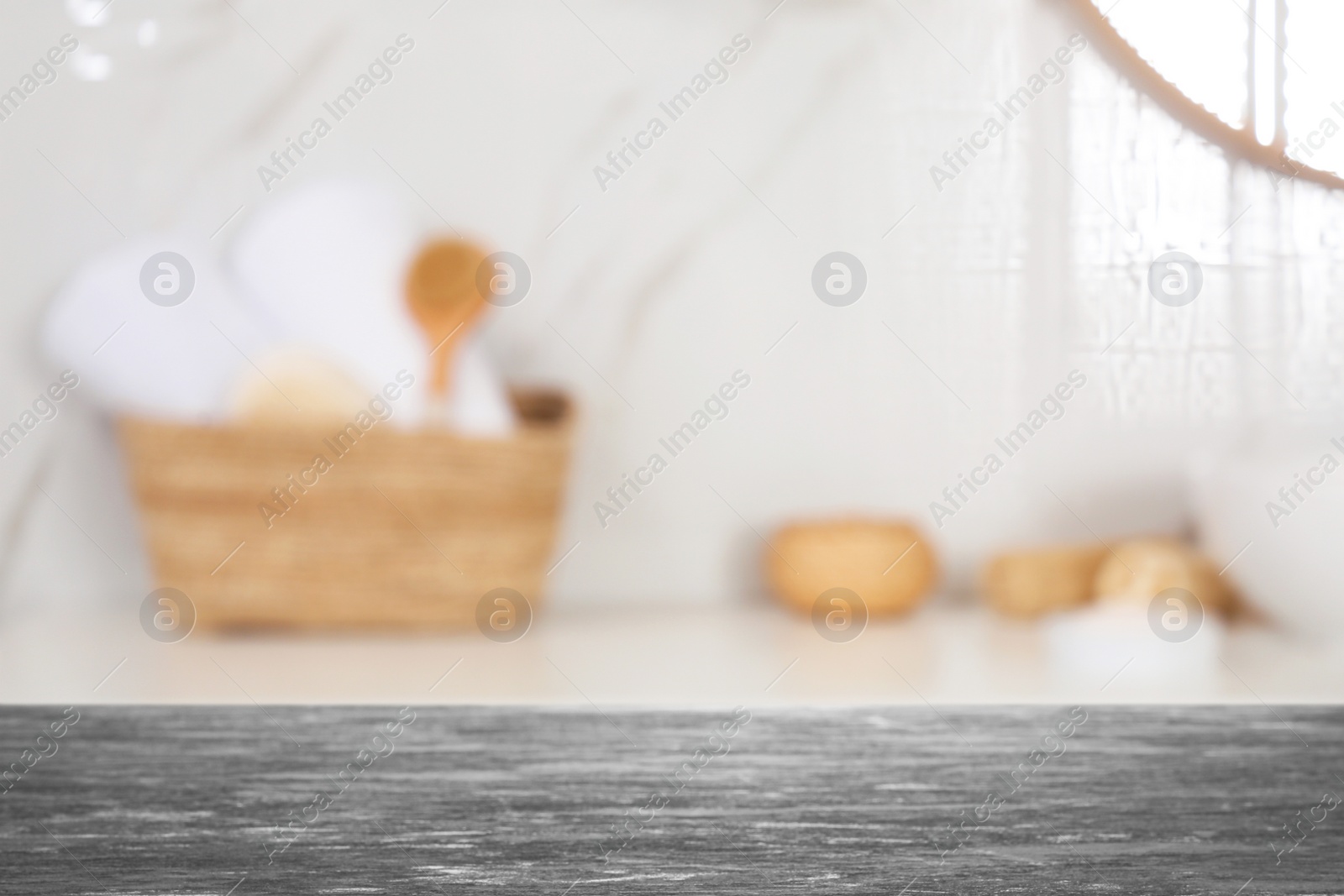 Image of Empty table and blurred view of stylish bathroom interior