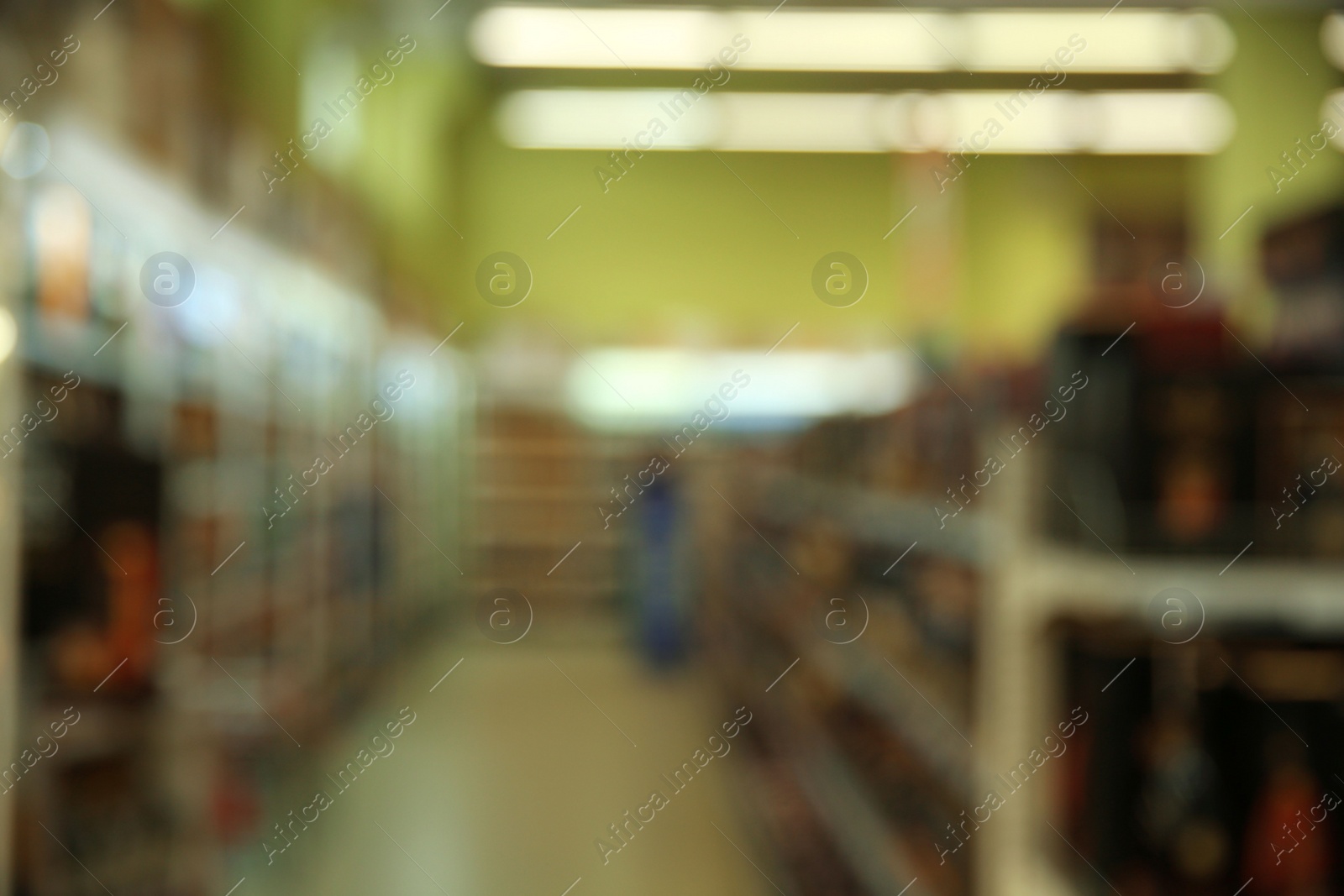 Photo of Blurred view of modern shopping mall interior