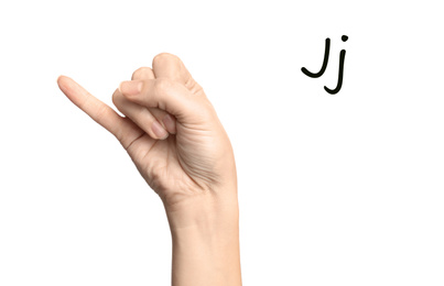 Image of Woman showing letter J on white background, closeup. Sign language