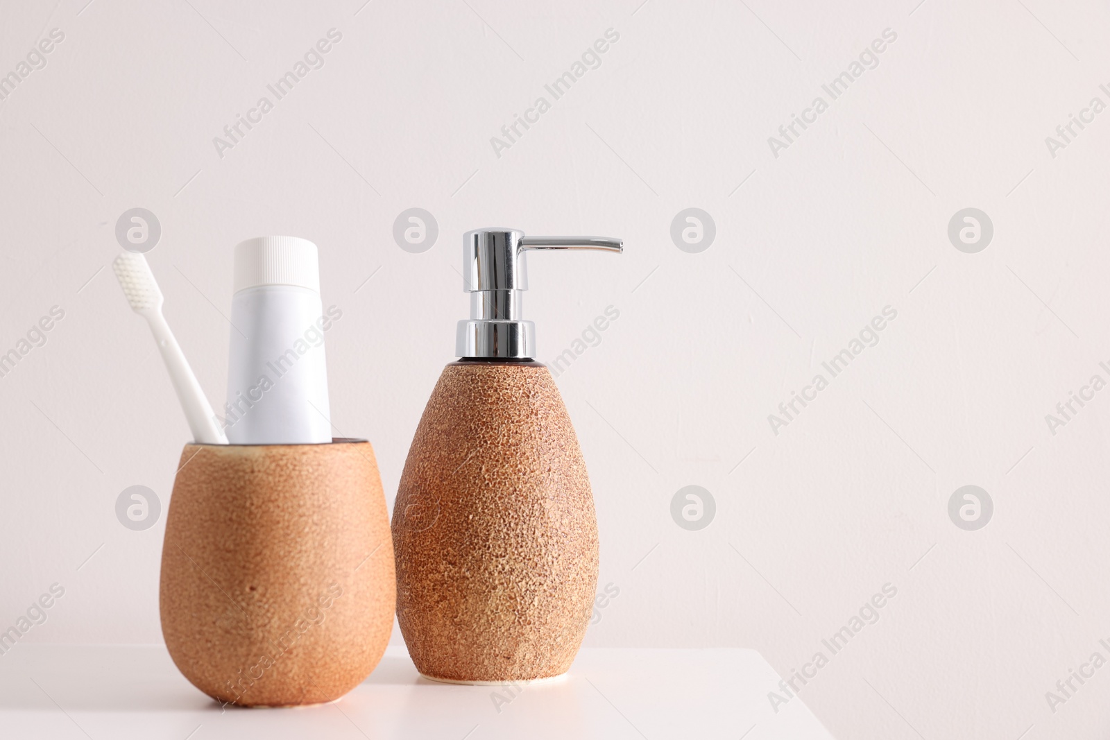 Photo of Different bath accessories and personal care products on white table, space for text