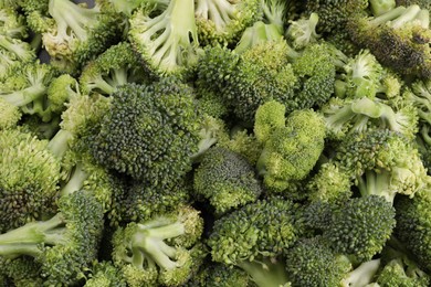 Fresh raw broccoli as background, top view