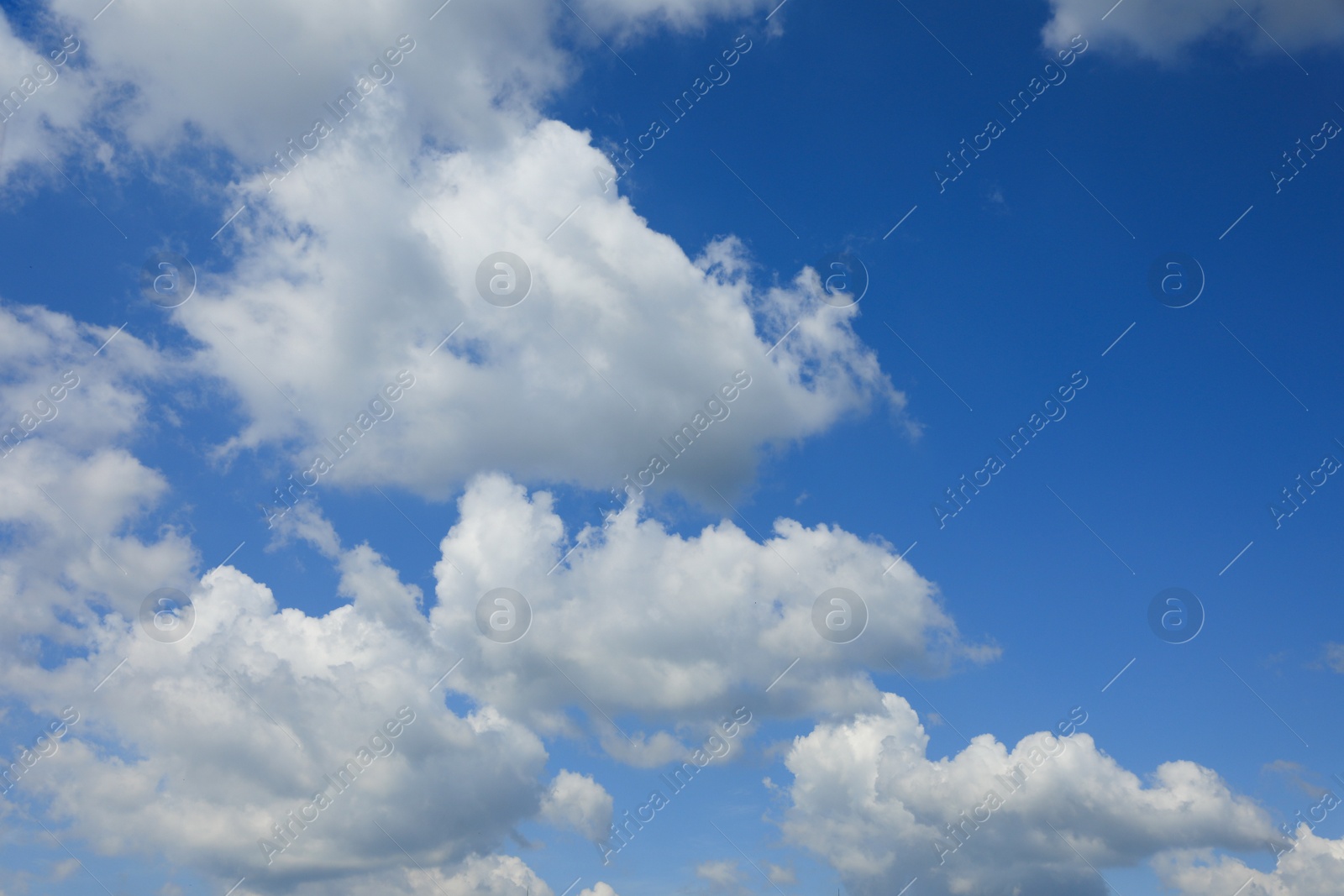 Photo of Beautiful blue sky with white fluffy clouds