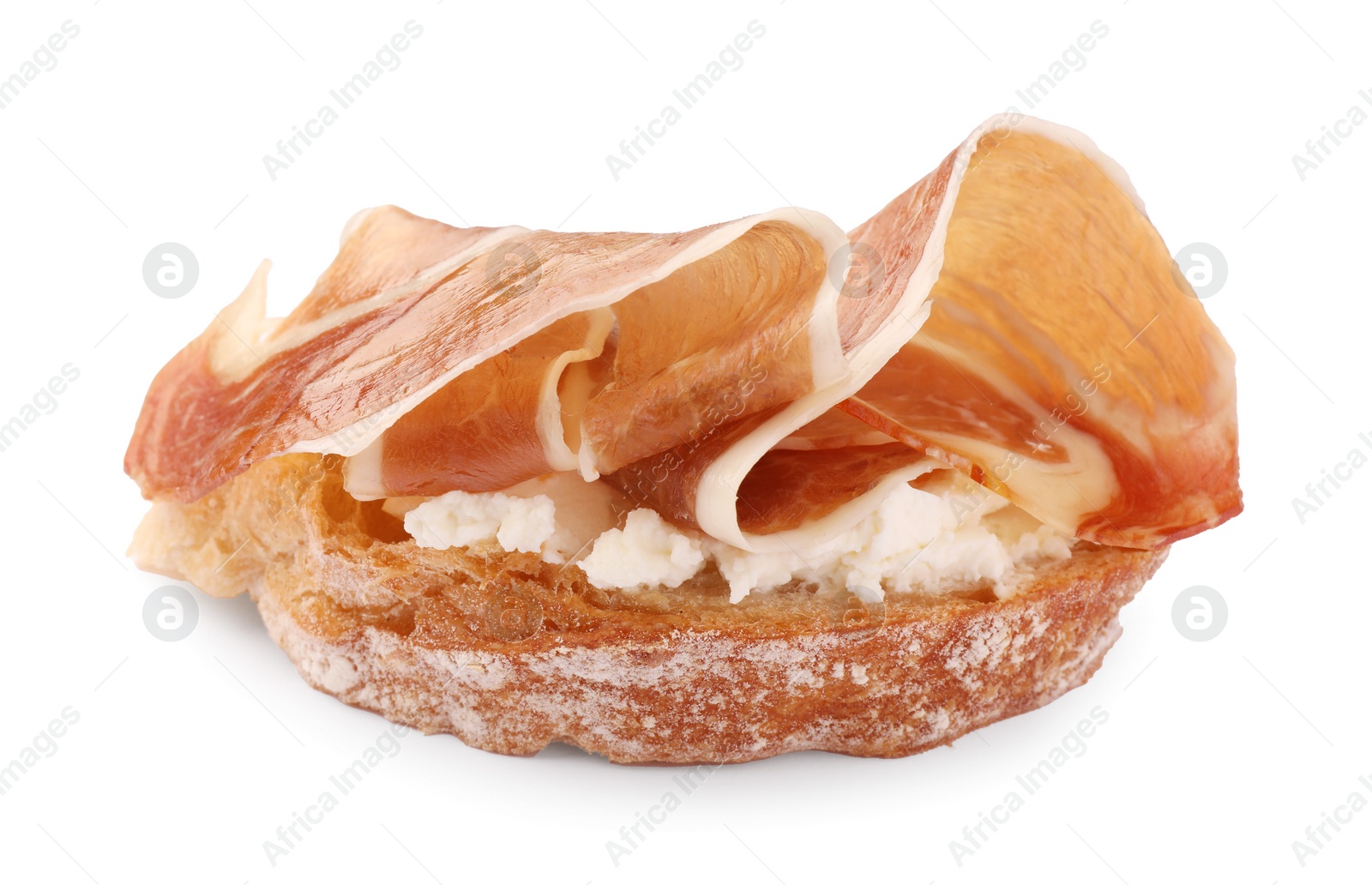 Photo of Tasty sandwich with cured ham and cream cheese isolated on white