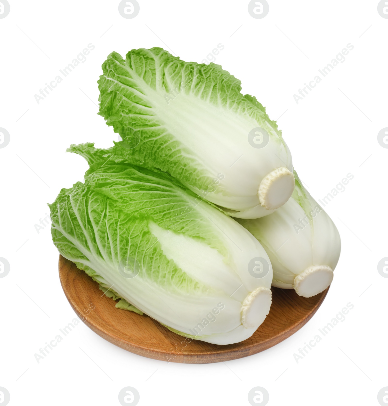 Photo of Fresh tasty Chinese cabbages and wooden board on white background